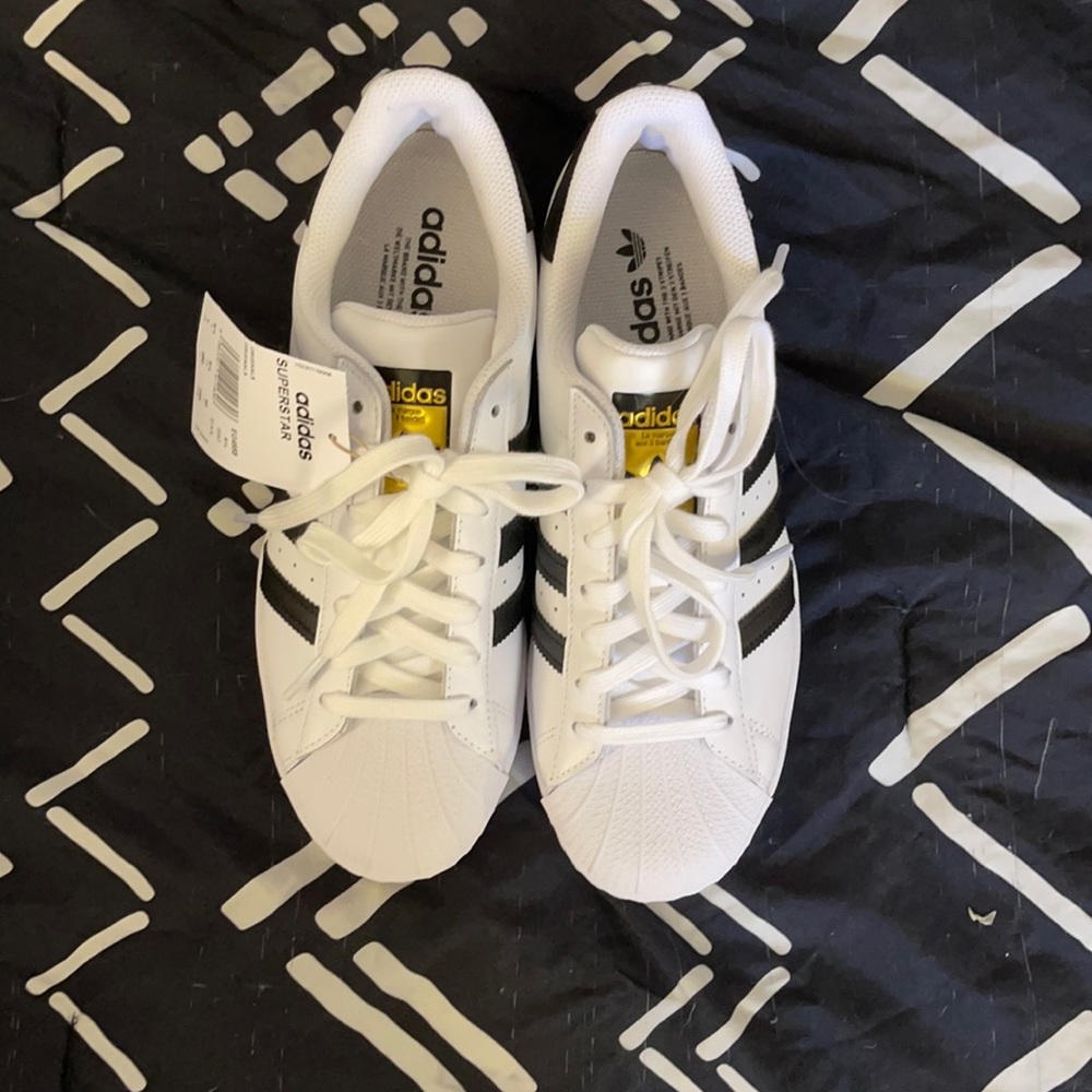 Never worn brand new Men’s Adidas